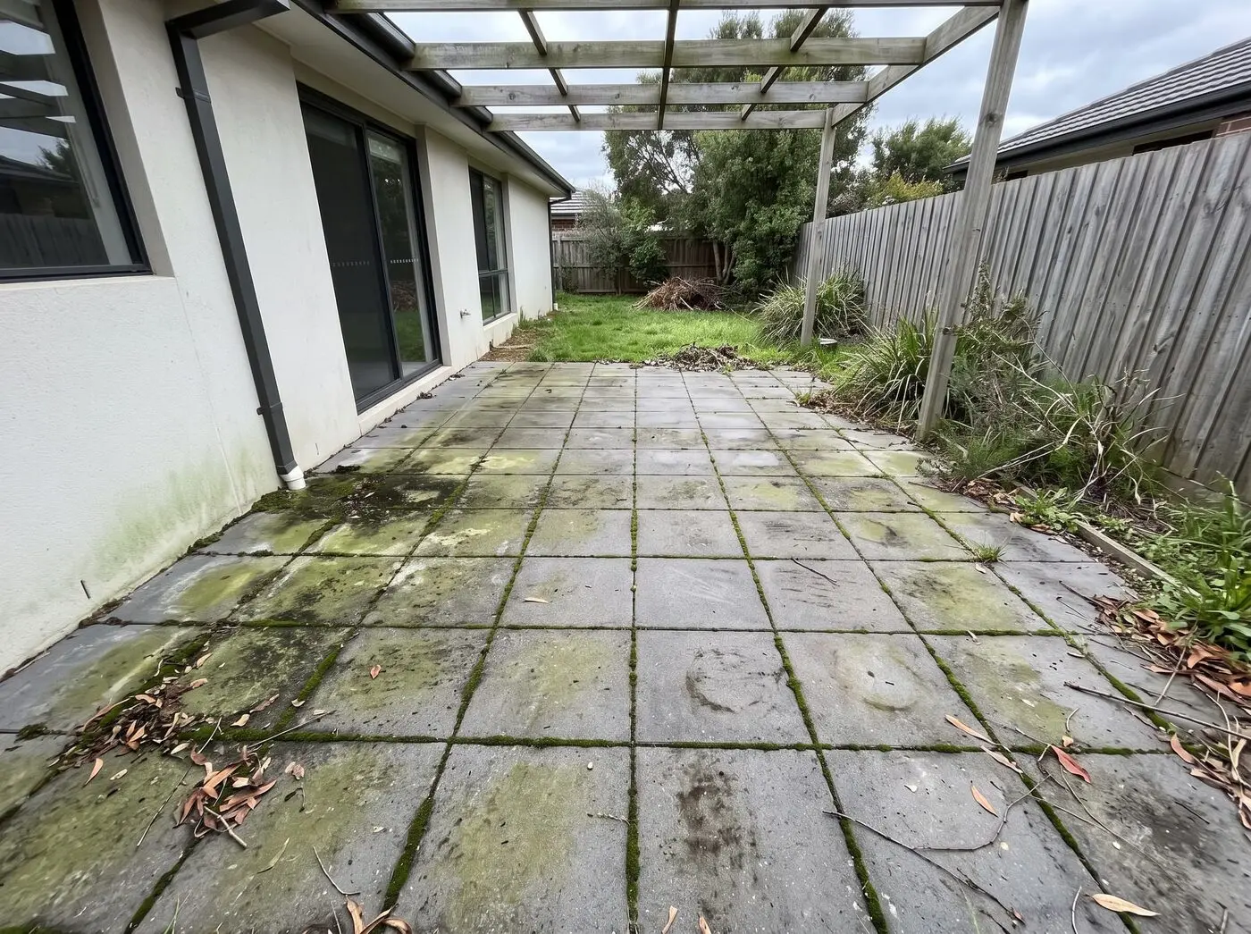 Paved courtyard before cleaning in Melbourne south-east